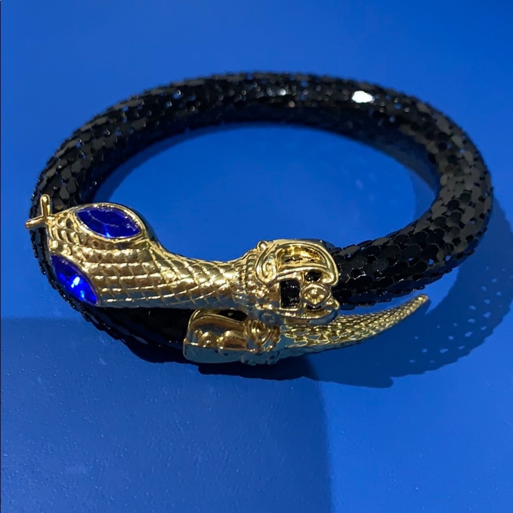 Black & gold w/blue eyes snake wrap bracelet. 🐍